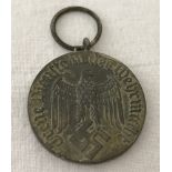 WWII pattern German Army 4 year service medal.