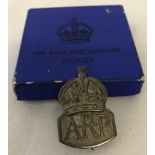 A hallmarked silver Air Raid Precautions ARP badge, in original box.
