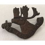 A WW1 pattern Newfoundland Regiment cap badge.