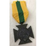 British North Borneo Bravery cross on yellow and green ribbon.