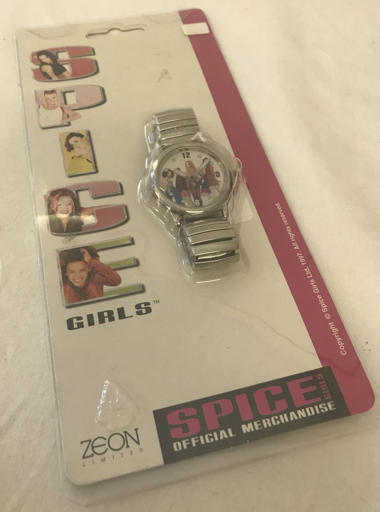 A blister packed Spice Girls wrist watch with facsimile band signatures to rear of packaging.