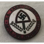 German WWII pattern RAD Reich Labour Service circular pin back lapel badge.