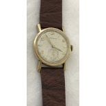 Vietnam War Era Wittnaur 10kt Gold filled wristwatch on brown leather strap with subsidiary dial.