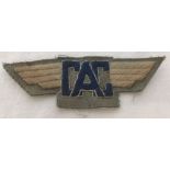 An American WW2 pattern Civil Air Guard cloth badge.