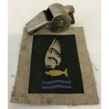 British WW2 pattern RAF Air Sea Rescue cloth badge and Air Ministry whistle.
