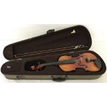 A vintage cased West German copy of an Antonio Stradivarius Faciebat Cremona violin.