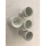 4 WWII pattern Kriegsmarine Egg Cups, all have small chips to base.