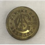 A Victorian Guinness James's Gate Brewery brass button.