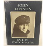 A first edition of " In His Own Write " by John Lennon.