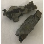 WWII London Blitz shrapnel fragments found at the time and kept in an old Players cigarette packet.