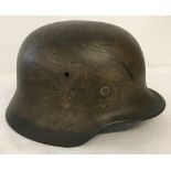 German WWII pattern D.A.K (Africa Corps) M40 helmet.