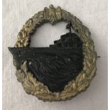 A WWII pattern Third Reich Navy war badge.