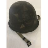 French tin helmet, marked to interior E.P.C Paris 1953, complete with liner.