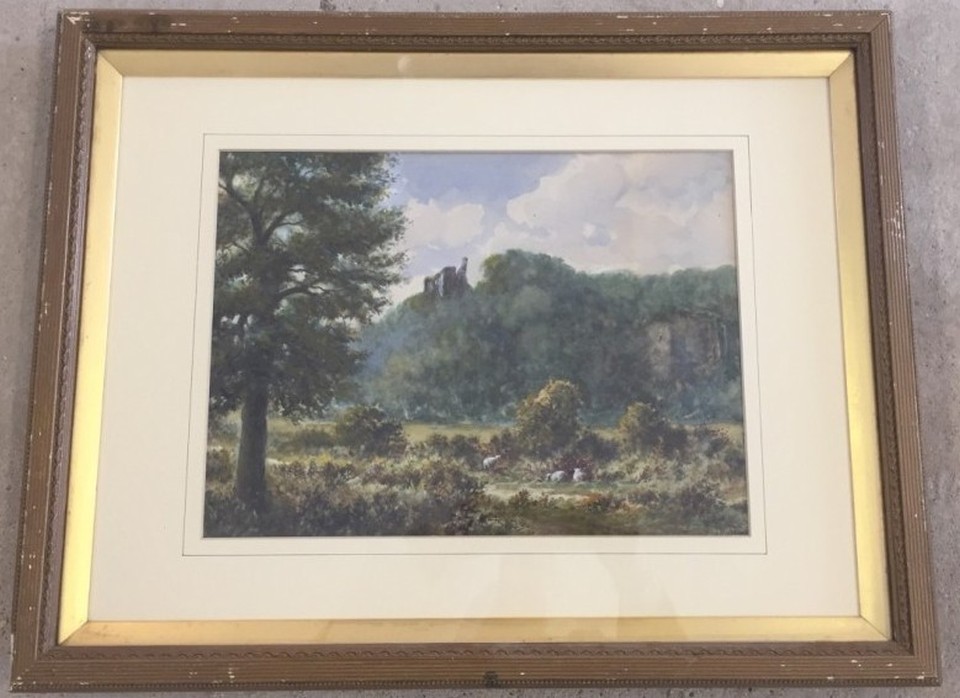 Signed watercolour landscape, with ruined castle atop a hill, with sheep grazing below.