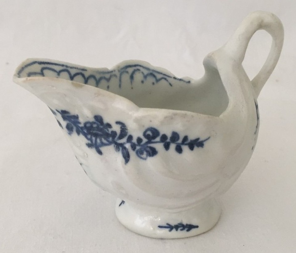 A blue and white Lowestoft dolphin ewer.