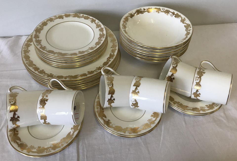 Wedgwood "Whitehall" design coffee set with gilt vine leaf decoration.