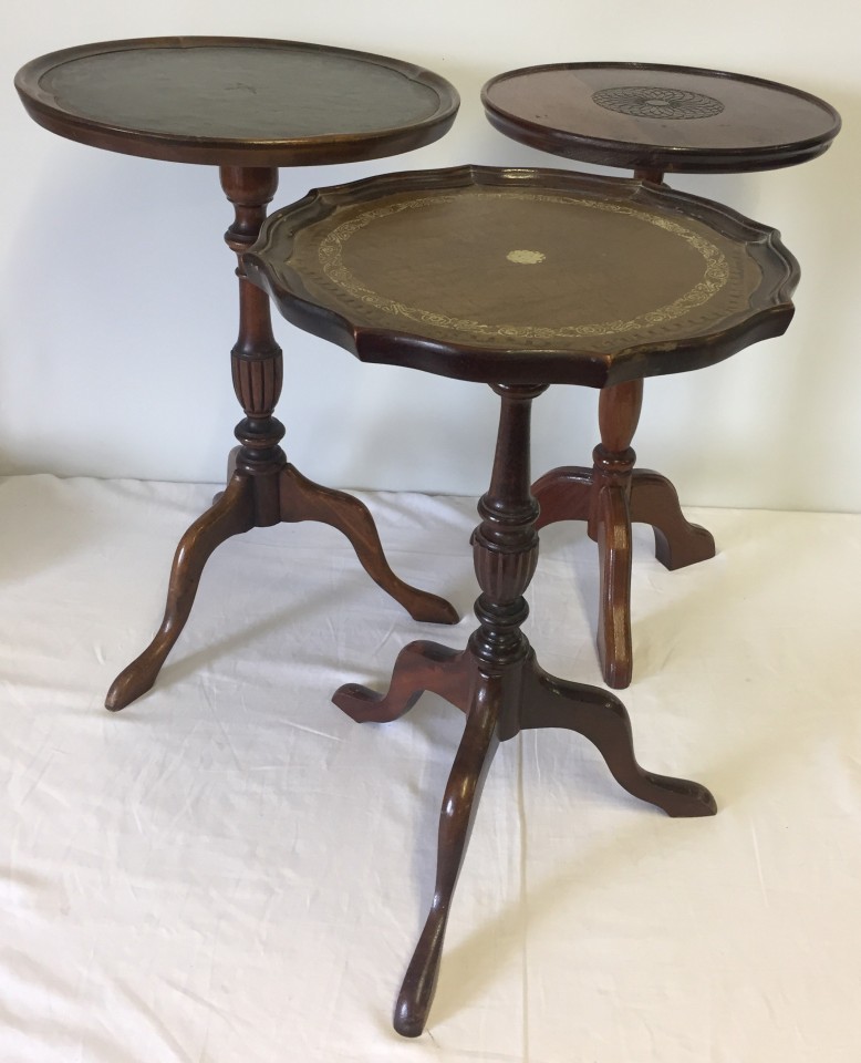 3 vintage tripod wine tables with turned pedestal bases. 2 with leather top inlay.