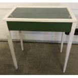 A painted pine glass topped display table with green baize interior.
