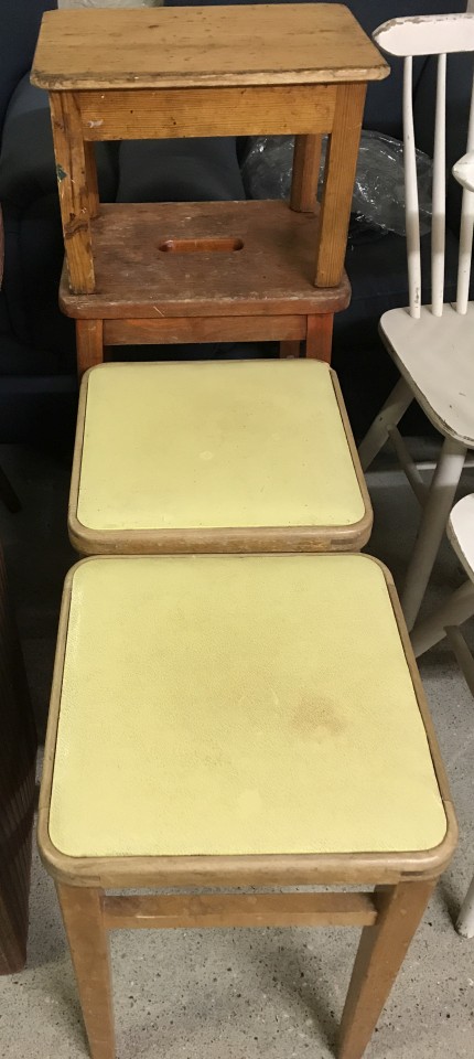 A collection of 4 wooden vintage kitchen stools.