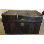 A vintage 2 handled tin trunk.