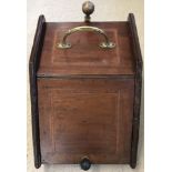 An Edwardian mahogany coal box with inlaid detail to top and lid.