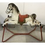 A large vintage tinplate MOBO Prairie King rocking horse.
