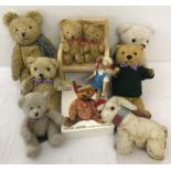 A collection of vintage teddies and other items.
