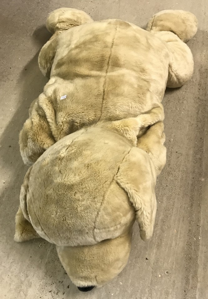 A very large soft toy Dog.