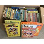 A box of vintage Enid Blyton books.