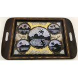 A vintage wooden framed souvenir tray from Rio de Janeiro, Brazil set with butterfly wings.