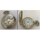 A modern pocket watch with fish decoration to front.