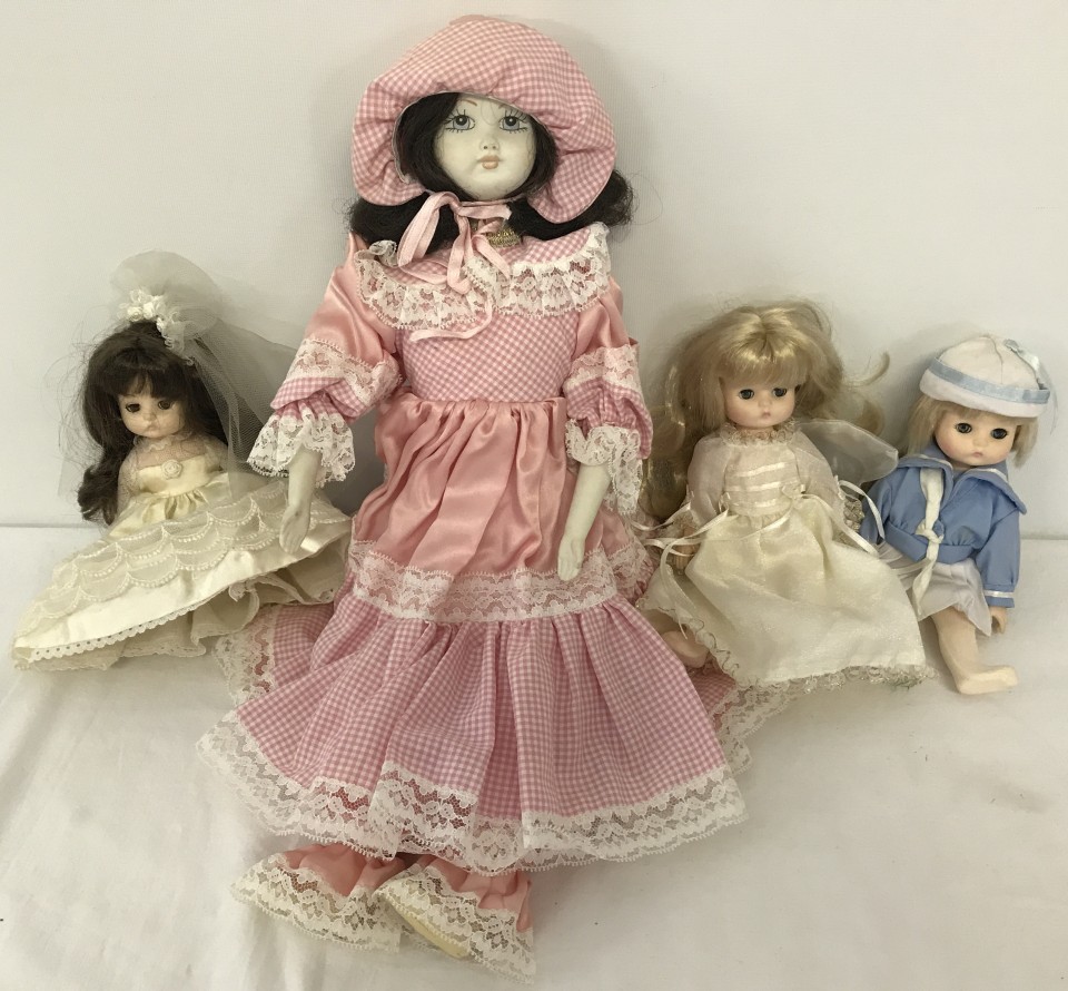 3 Effanbee, New York, dolls dated 1988 together with bisque headed doll in pink dress.