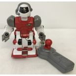 A 1990's wired remote control robot walking toy.