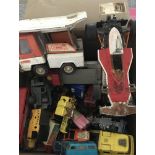 A box of mixed diecast vehicles.