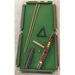 A vintage boxed Joe Davis table top snooker table and accessories.