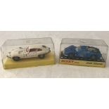 2 boxed Dinky sports cars.