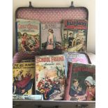 A suitcase of vintage children's story books and annuals.