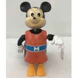 A vintage Mickey mouse swimmer toy.