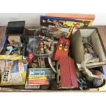 A box of assorted vintage toys.