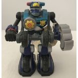 A 2002 Mattel Inc, Fisher Price Rescue Heroes Robo Team "Clamp Down" police robot.