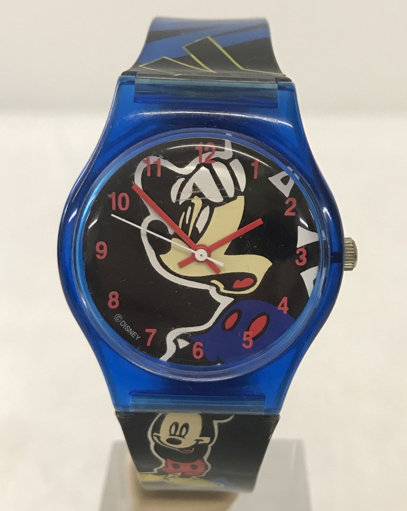 A Mickey Mouse wristwatch with blue plastic case and buckle.