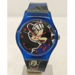 A Mickey Mouse wristwatch with blue plastic case and buckle.