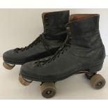 A pair of vintage roller skate boots.