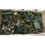 A box of assorted loose plastic soldiers and vehicles.