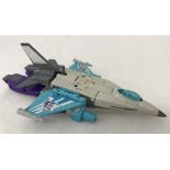 A 1987 Hasbro Transformers Decepticon figure of "Dreadwind", jet fighter toy.