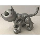 A 2001 Manley Quest interactive robotic cat with moveable legs, tail and head.