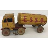 A tinplate wind-up Esso petrol tanker.