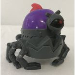 A 2010 TM & DWA McDonalds Robot Bug Toy with "Dog Bark" sound.