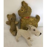 A vintage small straw filled teddy bear, together with 2 vintage straw filled dogs.