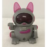 A 2001 TM & Tiger Electronics McDonalds Robot pink and grey Cat toy.